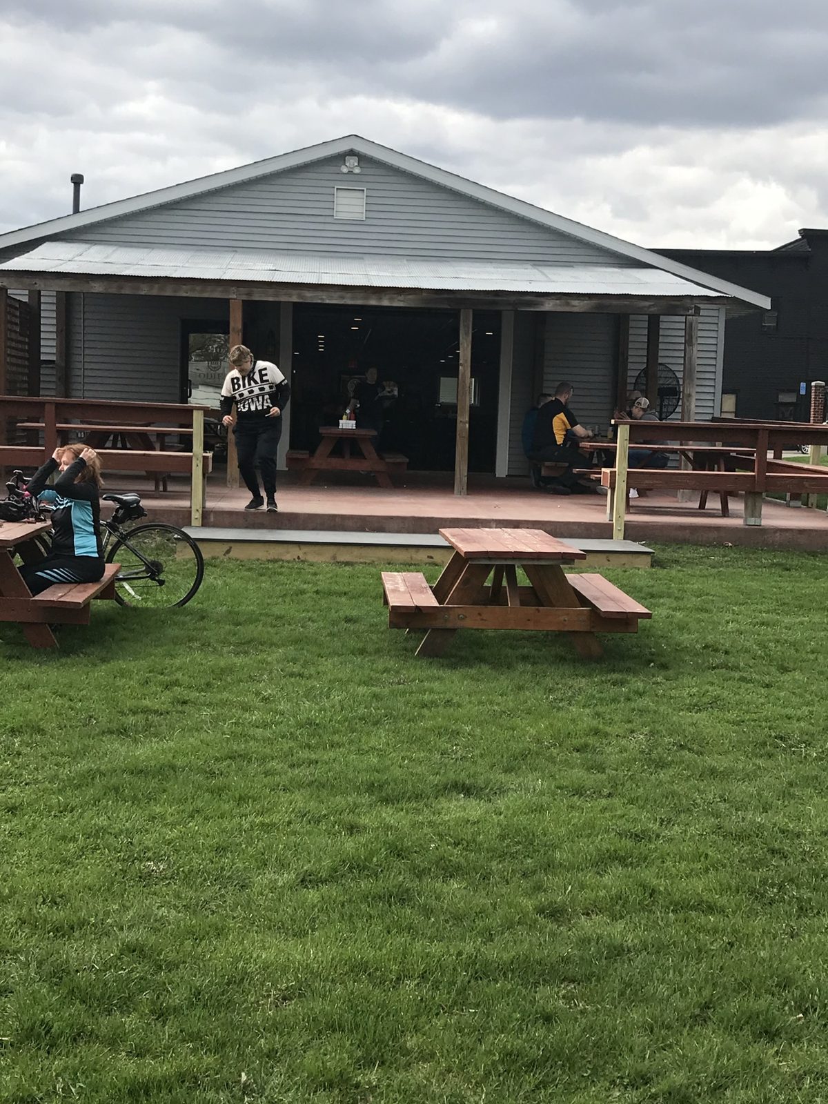 Odie's from the lawn, picnic tables out front