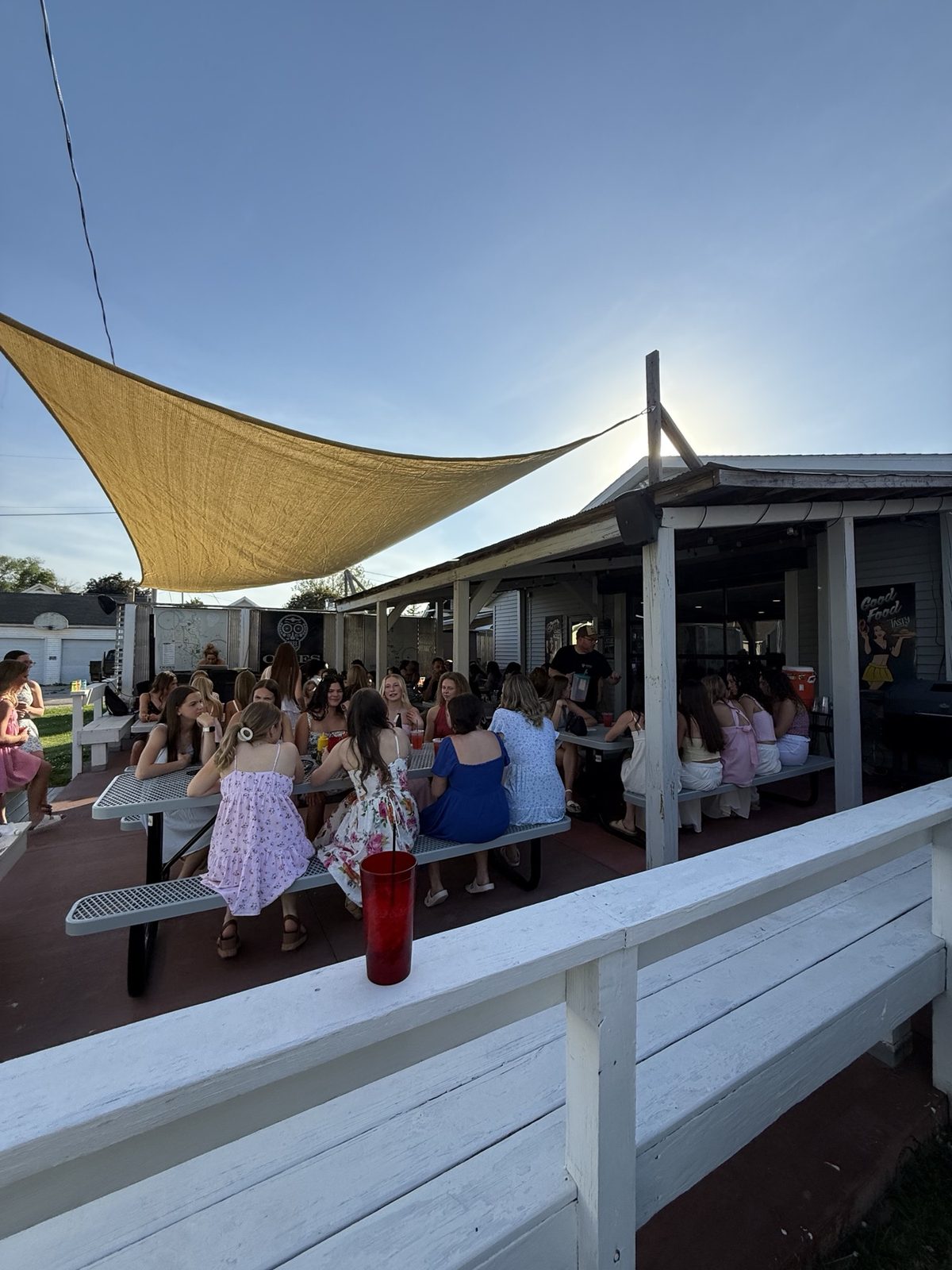 Picnic tables under the shade sail